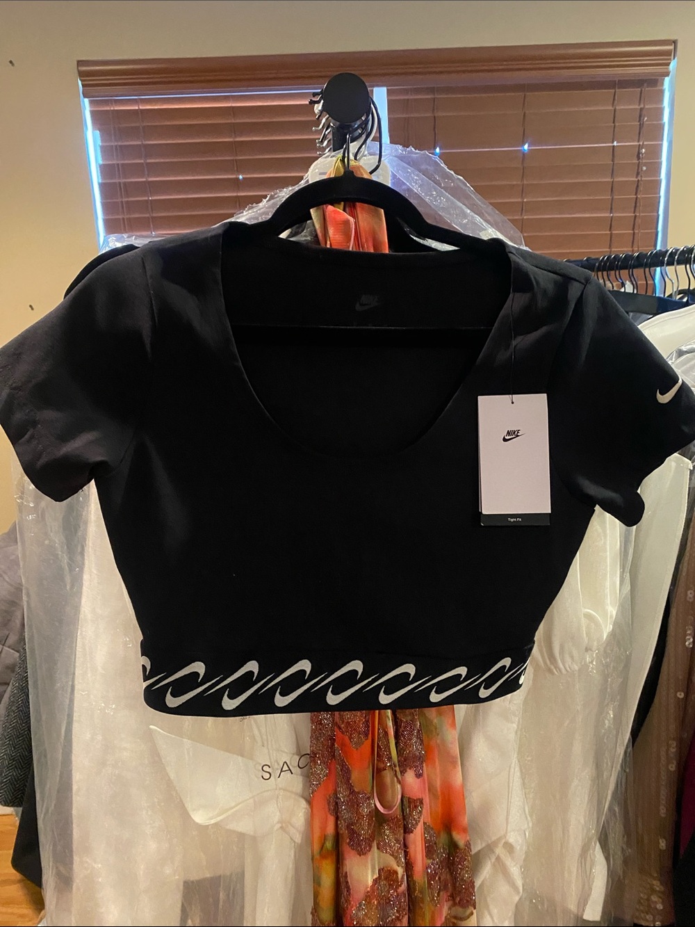 NWT Nike Black Short Sleeve Crop Top with White Wave Hem.